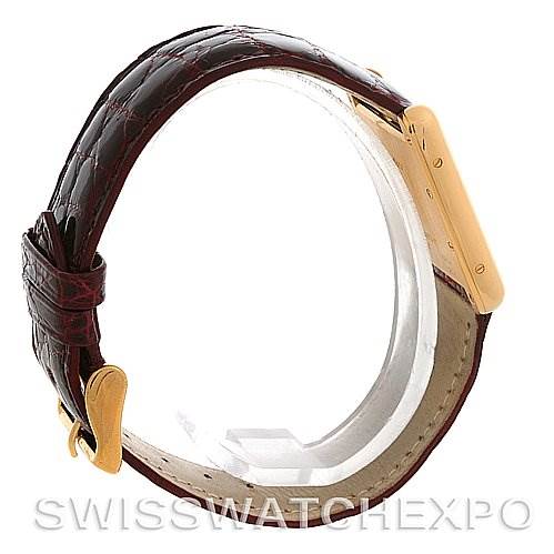 The image shows a side view of the Cartier Tank Louis W1529756 Yellow Gold White Dial W1529756 Yellow Gold White Dial watch, highlighting its strap and the side of its rectangular case.