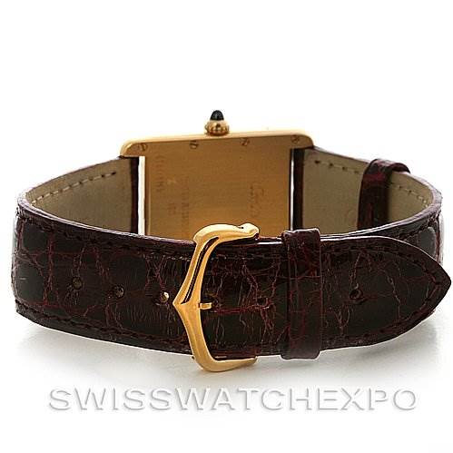 This image shows the back view of a Tank Louis model by Cartier, highlighting its case, clasp, and leather strap.