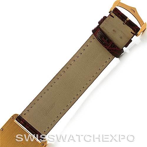This image shows the side view of the leather strap and clasp of a Cartier Tank Louis W1529756 Yellow Gold White Dial W1529756 Yellow Gold White Dial watch.