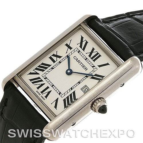 The image shows a Cartier Tank Louis W1540956 White Gold White Dial W1540956 White Gold White Dial watch at an oblique angle, highlighting its dial, Roman numerals, and black leather strap.