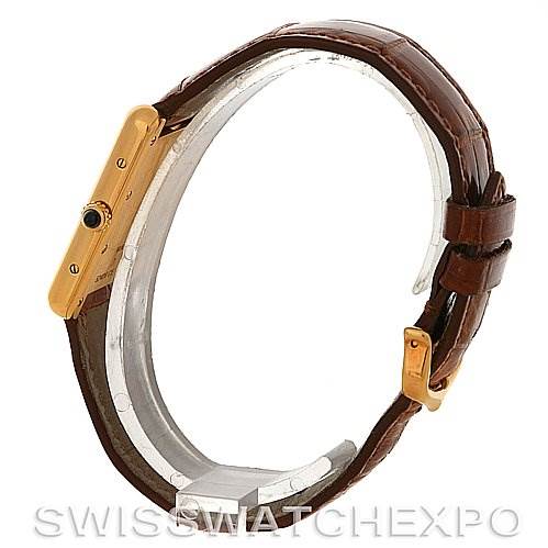 Side view of the Cartier Tank Louis W1529756 Yellow Gold White Dial W1529756 Yellow Gold White Dial watch, showcasing the strap, case, and crown.