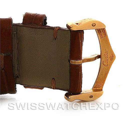 This image shows the clasp and part of the brown leather strap of a Cartier Tank Louis W1529756 Yellow Gold White Dial W1529756 Yellow Gold White Dial watch.