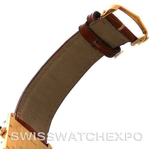 The image shows the inner side of the strap and buckle of a Cartier Tank Louis W1529756 Yellow Gold White Dial W1529756 Yellow Gold White Dial watch from a side angle.