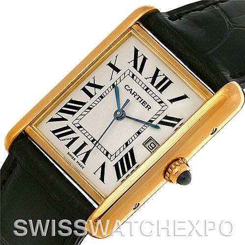 The image shows a close-up of a Cartier Tank Louis W1529756 Men
s Yellow Gold Silver Dial W1529756 Men
s Yellow Gold Silver Dial watch, highlighting its rectangular dial, Roman numerals, blue hands, and crown.