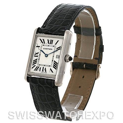The image shows a Tank Louis model by Cartier from a slightly tilted front angle, displaying the watch face and black leather strap.