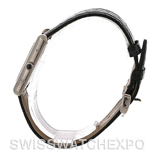 The image shows the side view of a Cartier Tank Louis W1540956 White Gold White Dial W1540956 White Gold White Dial watch with its crown and leather strap visible.