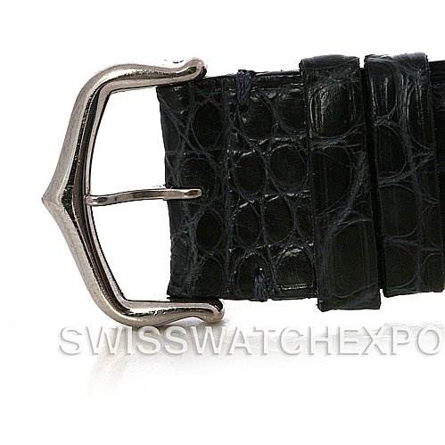 This image shows a close-up of the black leather strap and buckle of the Tank Louis Cartier watch.