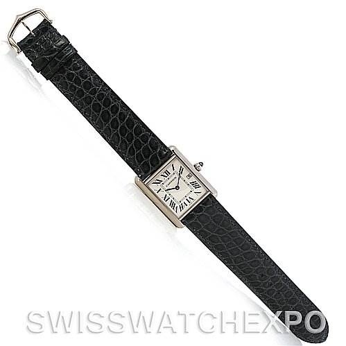 This image shows a Cartier Tank Louis W1540956 White Gold White Dial W1540956 White Gold White Dial model watch from an overhead angle, featuring a rectangular dial and black leather strap.
