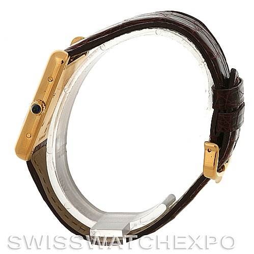 The image shows a side profile of the Cartier Tank Louis W1529756 Men
s Yellow Gold Silver Dial W1529756 Men
s Yellow Gold Silver Dial watch, highlighting its case, crown, and leather strap.