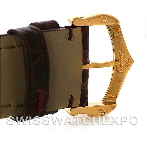 This image depicts a close-up of the buckle and leather strap of a Cartier Tank Louis W1529756 Men
s Yellow Gold Silver Dial W1529756 Men
s Yellow Gold Silver Dial watch.