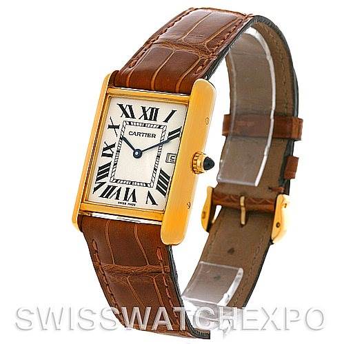 The image shows a Cartier Tank Louis W1529756 Men
s Yellow Gold Silver Dial W1529756 Men
s Yellow Gold Silver Dial watch at an angle highlighting its rectangular dial, gold case, and brown leather strap.