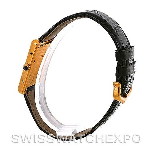 The image shows a Cartier Tank Louis W1529756 Men
s Yellow Gold Silver Dial W1529756 Men
s Yellow Gold Silver Dial watch from a side angle, highlighting the case and black leather strap.