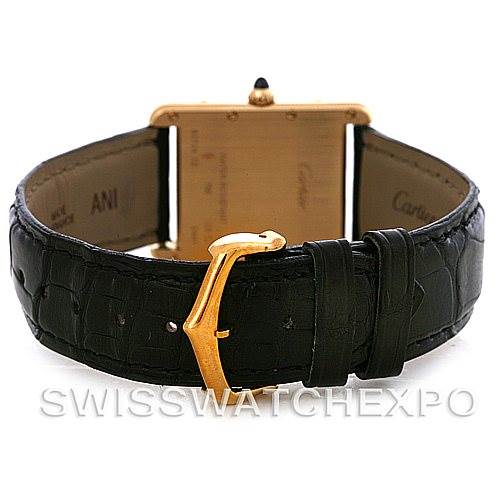 The image shows the back of a Cartier Tank Louis W1529756 Men
s Yellow Gold Silver Dial W1529756 Men
s Yellow Gold Silver Dial watch, focusing on the strap and clasp.