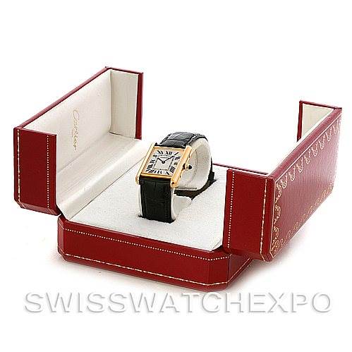 The Cartier Tank Louis W1529756 Men
s Yellow Gold Silver Dial W1529756 Men
s Yellow Gold Silver Dial watch is displayed at a three-quarter angle inside its red presentation box.