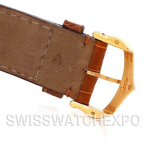 This image shows a close-up of the clasp and strap of a Cartier Tank Louis W1529756 Men
s Yellow Gold Silver Dial W1529756 Men
s Yellow Gold Silver Dial watch.