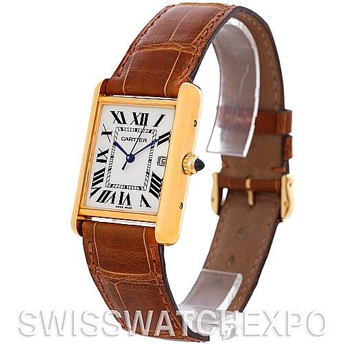 The Cartier Tank Louis W1529756 Men
s Yellow Gold Silver Dial W1529756 Men
s Yellow Gold Silver Dial watch is shown at an angle displaying the face, strap, and crown with a visible sapphire cabochon.