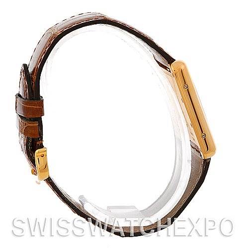 The image shows a side view of a Cartier Tank Louis W1529756 Men
s Yellow Gold Silver Dial W1529756 Men
s Yellow Gold Silver Dial watch, highlighting the case and strap buckles.