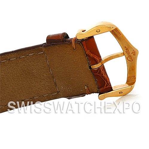 This image shows a close-up of the buckle and strap of a Cartier Tank Louis W1529756 Men
s Yellow Gold Silver Dial W1529756 Men
s Yellow Gold Silver Dial watch.