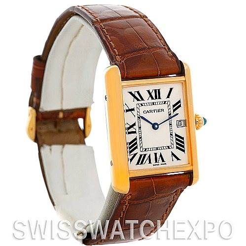 The image shows a Tank Louis by Cartier from a front angle, displaying its rectangular face, roman numeral markers, gold case, and brown leather strap.