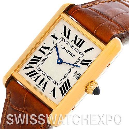 The image shows a Tank Louis Cartier watch from an angle highlighting its rectangular face, leather strap, and crown with a blue gem.