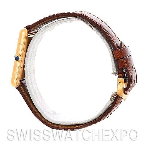 Side view of the Cartier Tank Louis W1529756 Men
s Yellow Gold Silver Dial W1529756 Men
s Yellow Gold Silver Dial watch showcasing the case, crown, and brown leather strap.