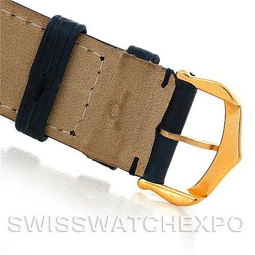 This image shows a close-up of the buckle and strap of a Cartier Tank Louis W1529756 Men
s Yellow Gold Silver Dial W1529756 Men
s Yellow Gold Silver Dial watch.