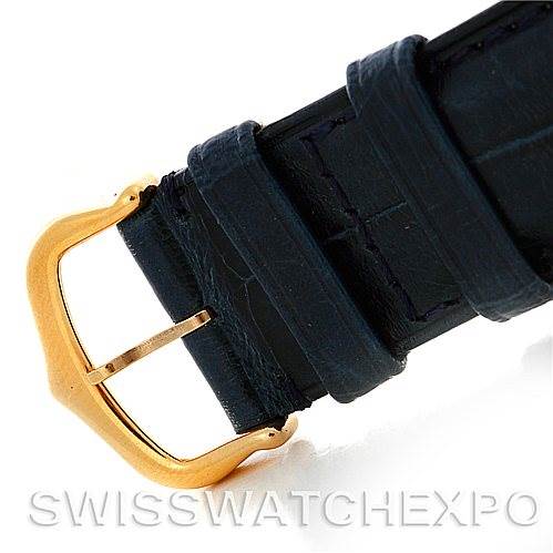 This image shows a close-up of the strap and buckle of the Cartier Tank Louis W1529756 Men
s Yellow Gold Silver Dial W1529756 Men
s Yellow Gold Silver Dial watch from an angled side view.