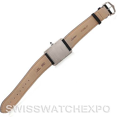 The image shows the back view of a Tank Louis watch by Cartier, displaying the strap and the underside of the watch case.