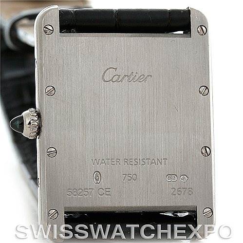 The image shows the back casing of a Cartier Tank Louis W1540956 Men's White Gold White Dial W1540956 Men's White Gold White Dial watch, highlighting the brand engraving and water resistance details.