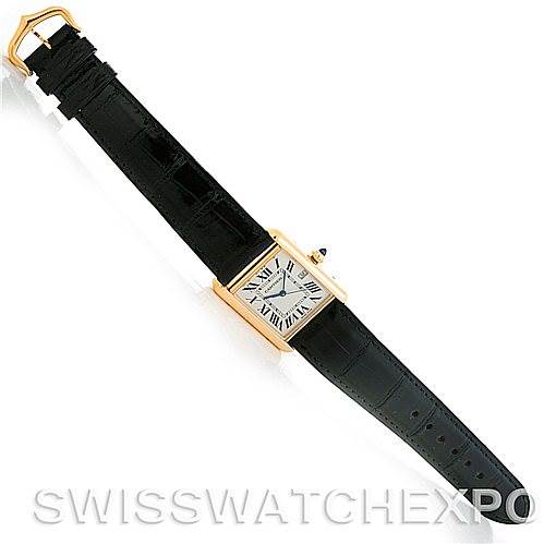 The Cartier Tank Louis W1529756 Men
s Yellow Gold Silver Dial W1529756 Men
s Yellow Gold Silver Dial watch is shown from an overhead angle, displaying the entire strap and face.
