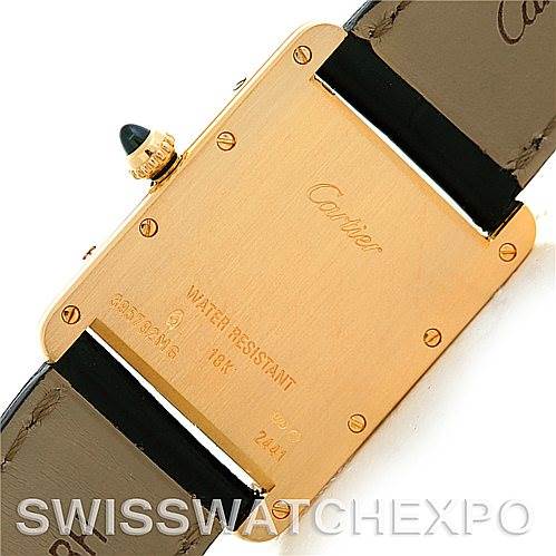 This image shows the backside of a Tank Louis model by Cartier, displaying the screws, case back, and strap attachment points.