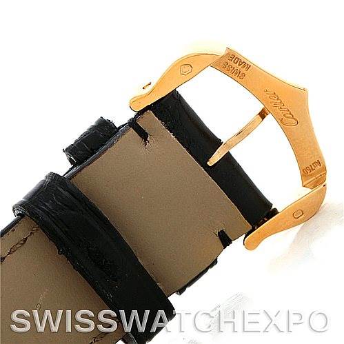 The image shows the buckle and strap of a Cartier Tank Louis W1529756 Men
s Yellow Gold Silver Dial W1529756 Men
s Yellow Gold Silver Dial watch, highlighting the gold clasp and black leather strap.