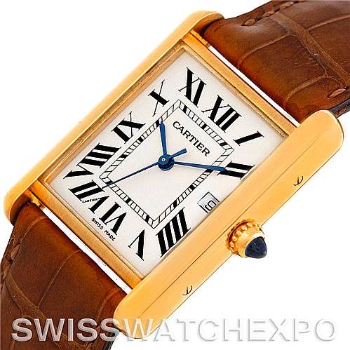 This image shows a Cartier Tank Louis W1529756 Men's Yellow Gold Silver Dial W1529756 Men's Yellow Gold Silver Dial watch at an angled top view, highlighting the rectangle dial, blue hands, and brown leather strap.