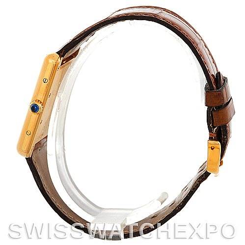 This image shows a side view of the Cartier Tank Louis W1529756 Men's Yellow Gold Silver Dial W1529756 Men's Yellow Gold Silver Dial watch, highlighting its case, crown, and leather strap.