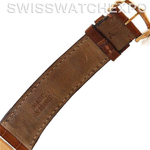 The image shows the strap and buckle of a Cartier Tank Louis W1529756 Men's Yellow Gold Silver Dial W1529756 Men's Yellow Gold Silver Dial model watch from the underside.