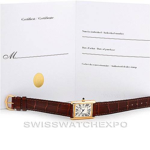 The image shows a Tank Louis model watch by Cartier, laid flat, alongside its open certificate booklet.