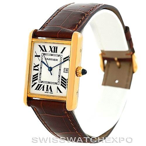 This image shows a Cartier Tank Louis W1529756 Men's Yellow Gold Silver Dial W1529756 Men's Yellow Gold Silver Dial watch angled from the front and slightly to the left, showcasing its gold case, white dial, and brown leather strap.