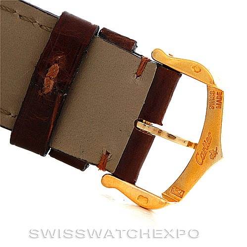 The image shows a close-up of the brown leather strap and gold buckle of the Cartier Tank Louis W1529756 Men's Yellow Gold Silver Dial W1529756 Men's Yellow Gold Silver Dial model watch.