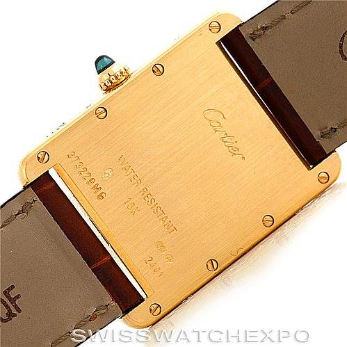 This image shows the back view of a Tank Louis model by Cartier, highlighting the case, strap, and inscription details.