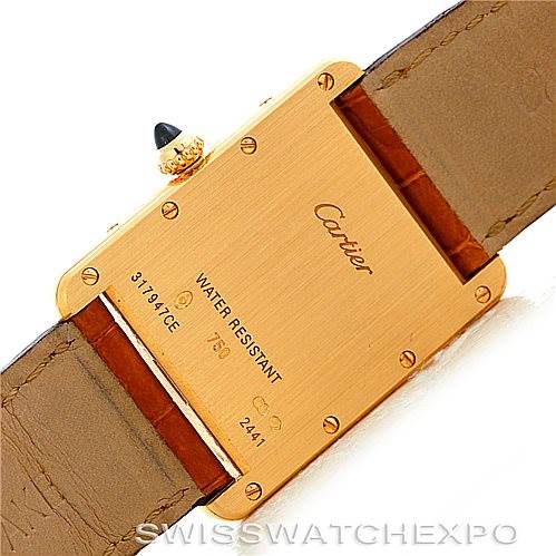 This image shows the back view of a Cartier Tank Louis W1529756 Men's Yellow Gold Silver Dial W1529756 Men's Yellow Gold Silver Dial watch, highlighting the case, crown, and leather strap.