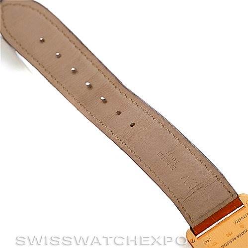 This image shows the backside of the leather strap and part of the clasp of a Cartier Tank Louis W1529756 Men's Yellow Gold Silver Dial W1529756 Men's Yellow Gold Silver Dial watch.