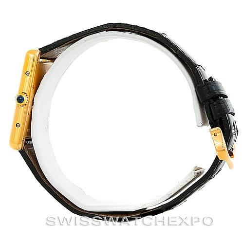 This image shows a side view of the Cartier Tank Louis W1529756 Men's Yellow Gold Silver Dial W1529756 Men's Yellow Gold Silver Dial watch, focusing on the case, crown, and black leather strap.