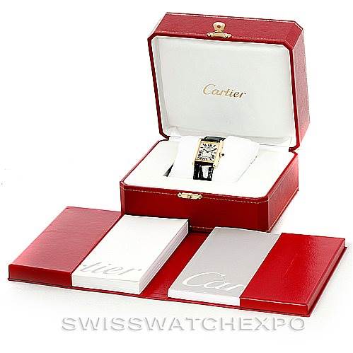 The image shows a Cartier Tank Louis W1529756 Men's Yellow Gold Silver Dial W1529756 Men's Yellow Gold Silver Dial watch in its red box, accompanied by booklets also in red and white covers.
