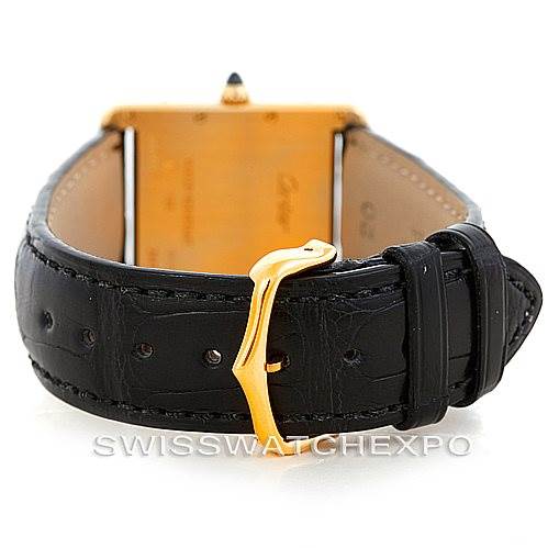 The image shows the back of the Cartier Tank Louis W1529756 Men's Yellow Gold Silver Dial W1529756 Men's Yellow Gold Silver Dial watch, focusing on the buckle and leather strap.