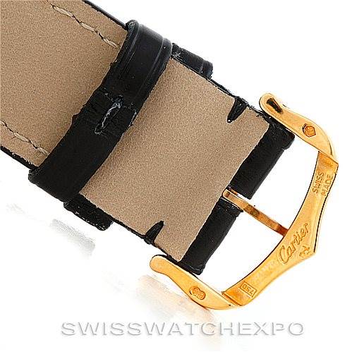 The image shows a close-up view of the clasp and leather strap of a Tank Louis model watch by Cartier.