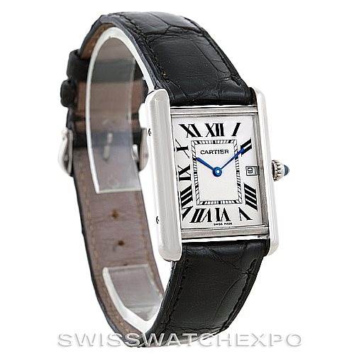 The Cartier Tank Louis W1540956 Men's White Gold White Dial W1540956 Men's White Gold White Dial watch is shown at a slight angle, displaying its rectangular face, Roman numerals, leather strap, and crown.
