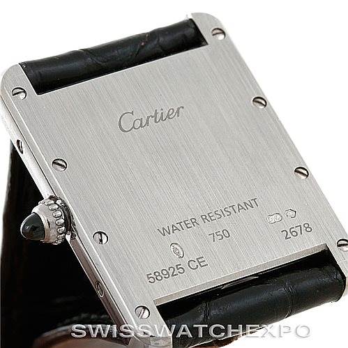 The image shows the back case of a Cartier Tank Louis W1540956 Men's White Gold White Dial W1540956 Men's White Gold White Dial watch, detailing the brand name, water resistance, and serial number.