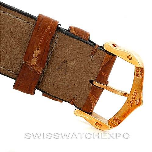 This image shows a close-up of the buckle and strap of a Cartier Tank Louis W1529756 Men's Yellow Gold Silver Dial W1529756 Men's Yellow Gold Silver Dial watch, highlighting the leather strap and branded buckle.