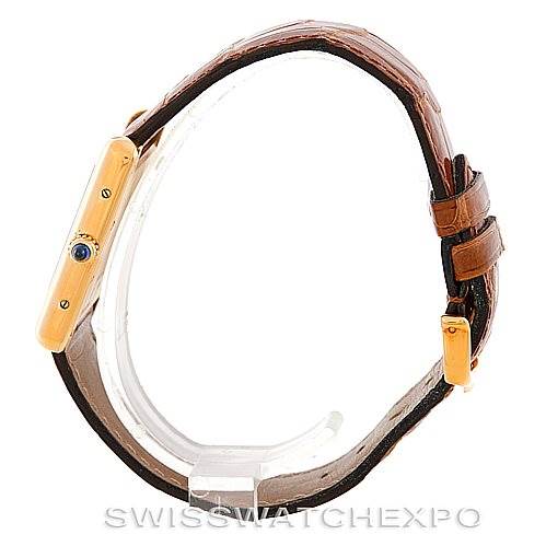 The image shows a side view of a Cartier Tank Louis W1529756 Men's Yellow Gold Silver Dial W1529756 Men's Yellow Gold Silver Dial watch, highlighting its gold case and brown leather strap.