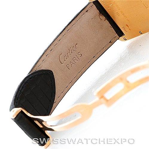 This image shows the inner leather strap and part of the deployment clasp of a Cartier Tank Louis W1529756 Men's Yellow Gold Silver Dial W1529756 Men's Yellow Gold Silver Dial watch.